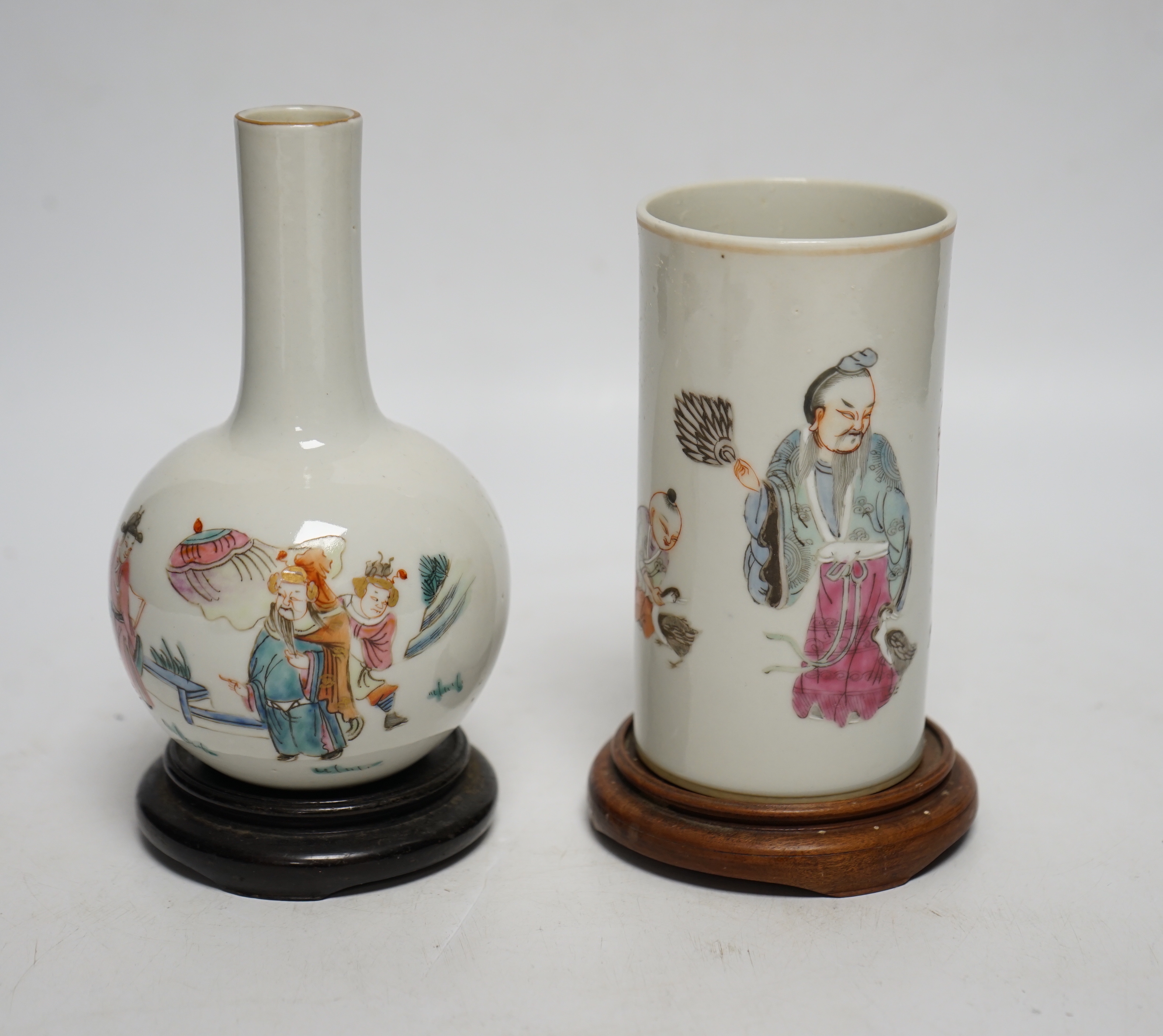 A Chinese famille rose brush pot and bottle vase, both with stands, tallest 16cm